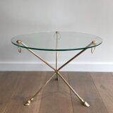 Round coffee table of neoclassical style in brass