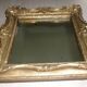 Miroir en bois et stuc redoré de style rocaille 33x29