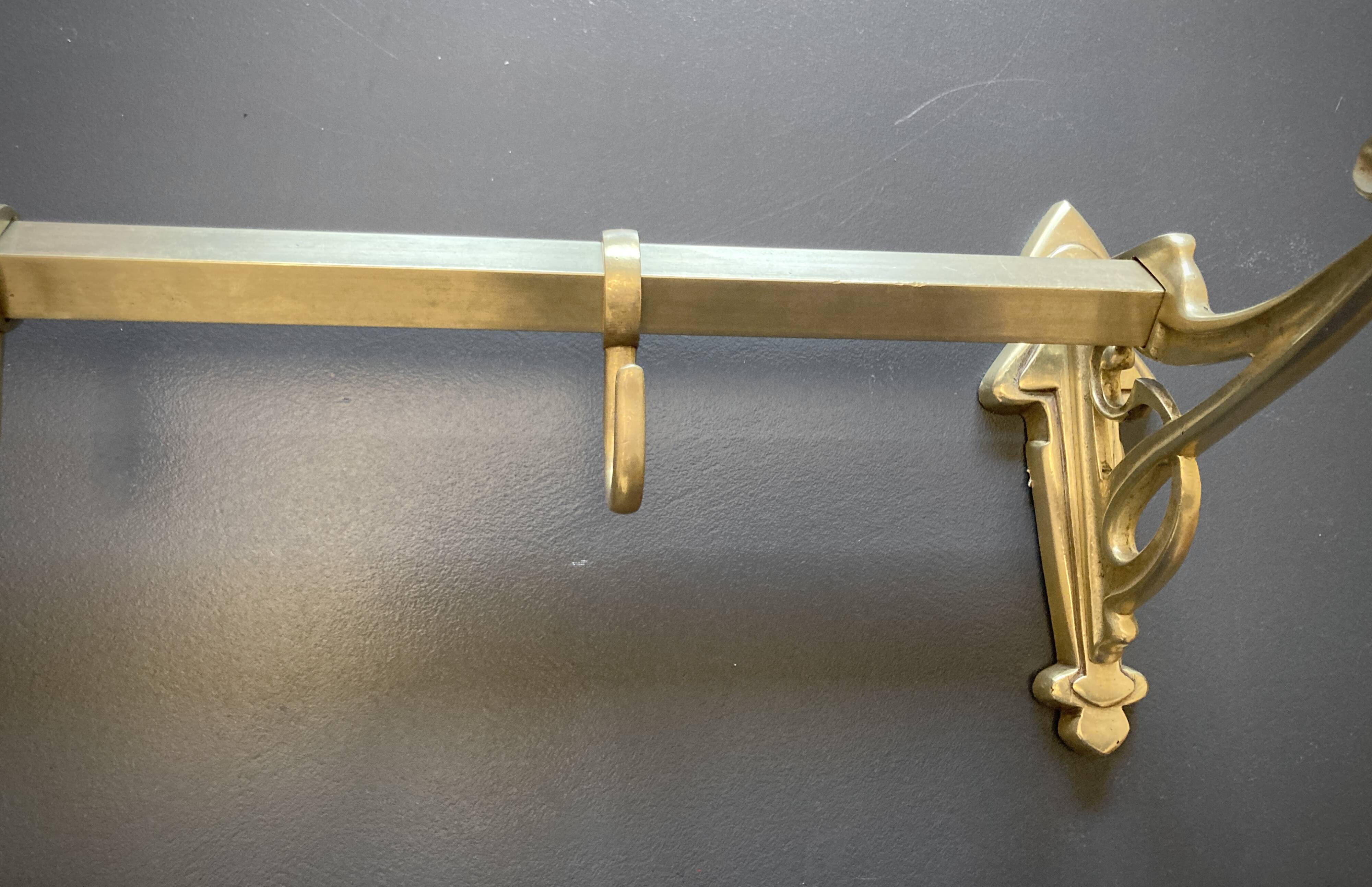 Art-deco wall-mounted coat rack in brass