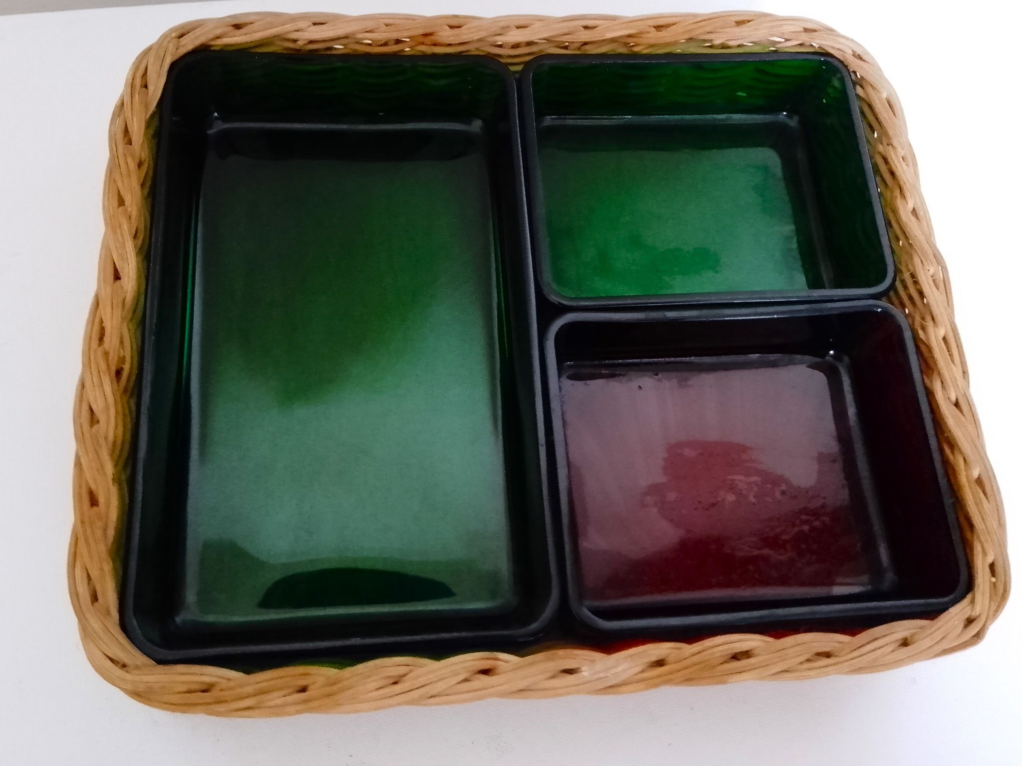 Set with appetizers, wicker tray and 3 colored glass ramekins