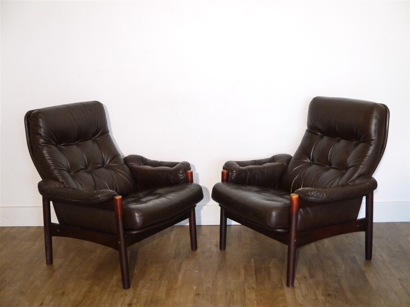 Pair of Scandinavian leather armchairs with ottomans 1970