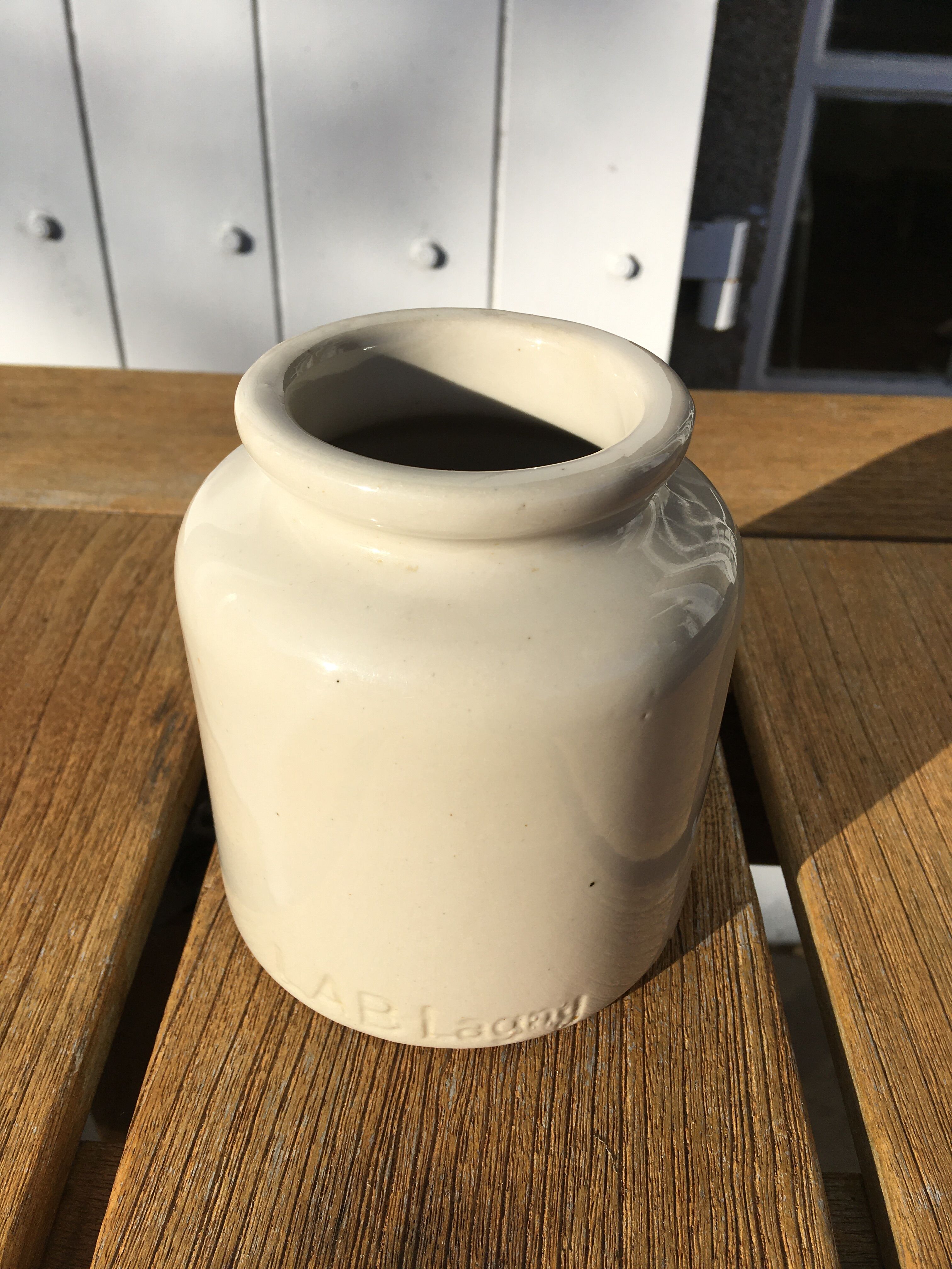 Beige sandstone mustard pot