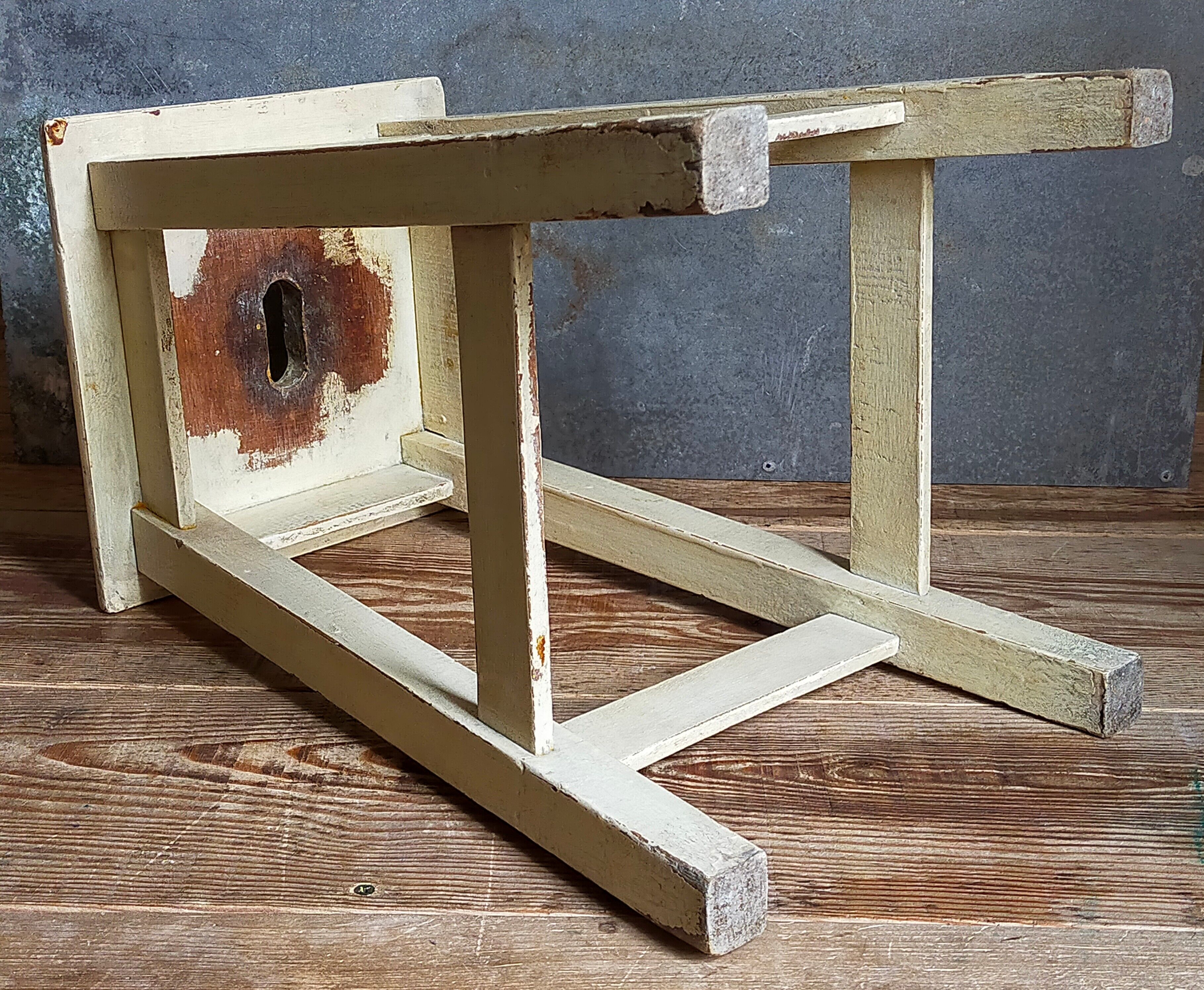 Wooden workshop stool with old patina