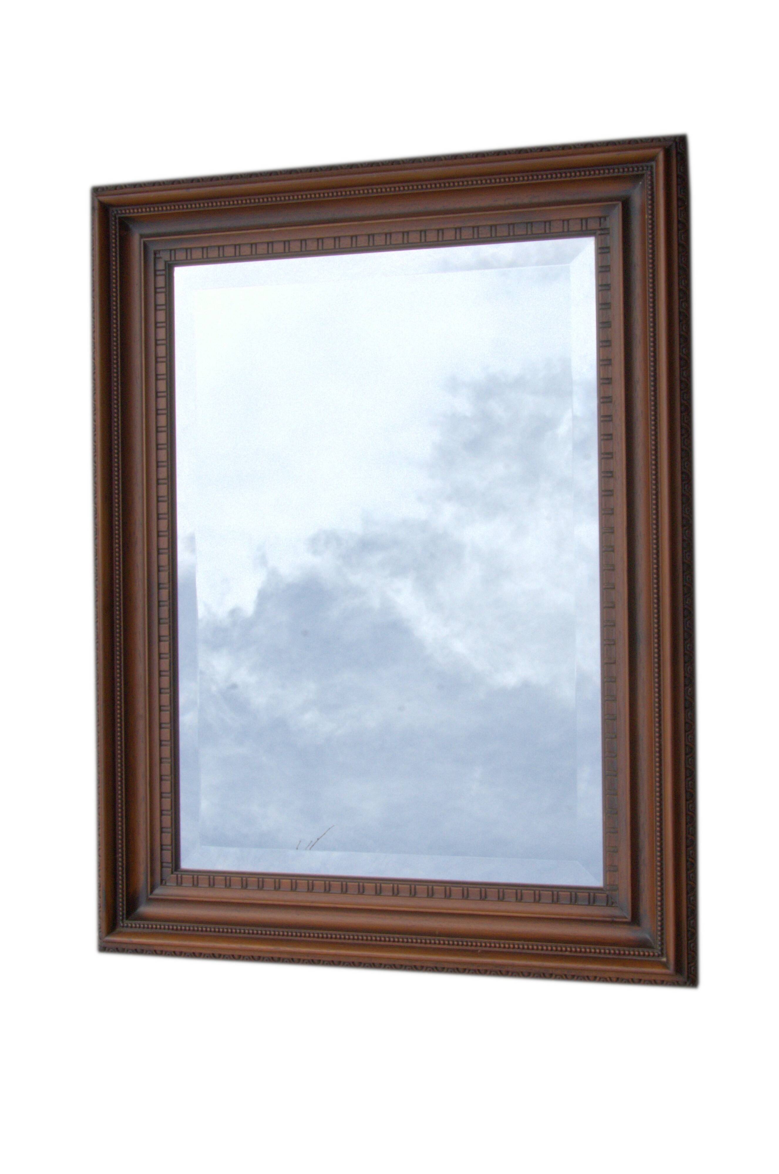 Vertical mirror, bevelled glass and carved wooden frame, 68x88cm