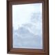 Mirror, bevelled glass and carved wooden frame.