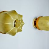 Pair of "cocoon" wall lights, resin and pine, Italy, 1970