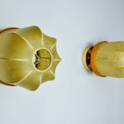 Pair of "cocoon" wall lights, resin and pine, Italy, 1970