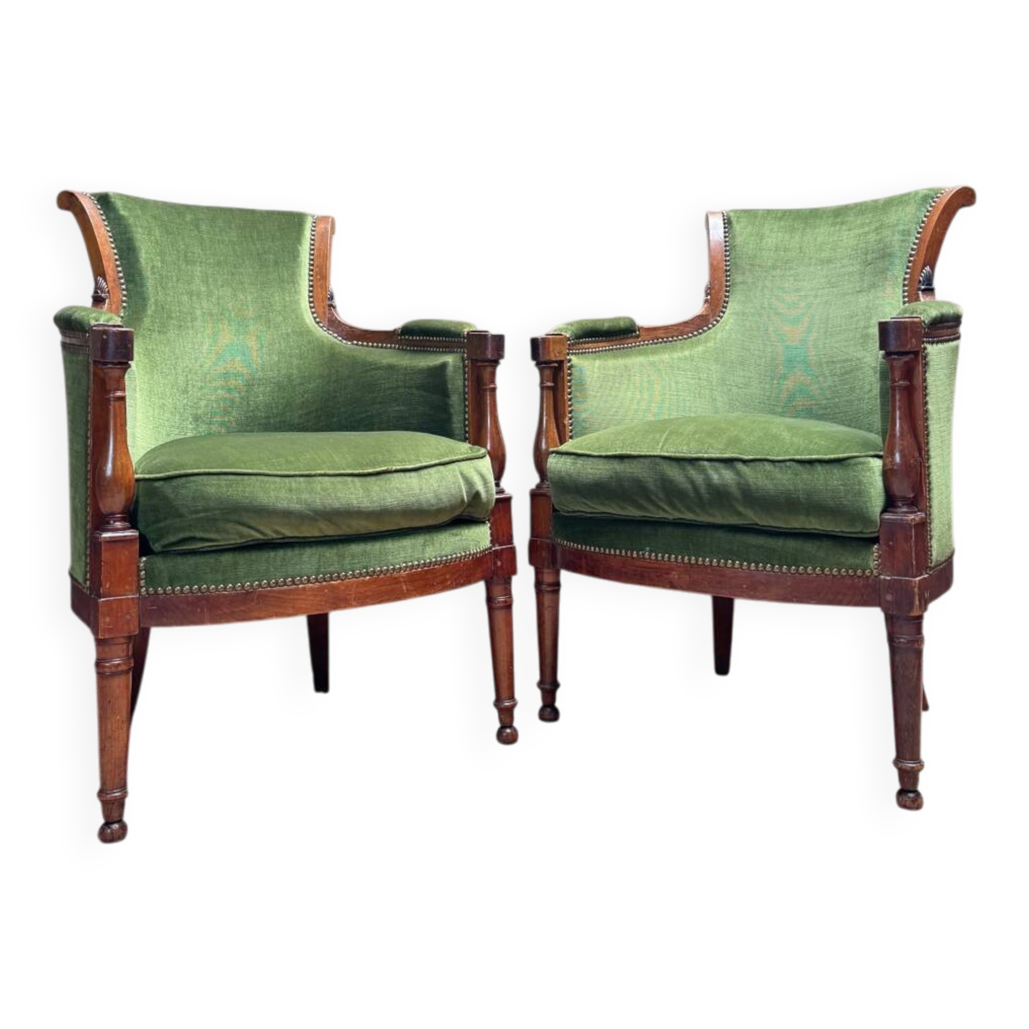 Pair of mahogany cabriolet bergère armchairs from the 18th-century Directoire period.