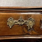 Curved and carved Lyonnaise chest of drawers from the Louis XV period in solid walnut