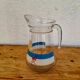 Vintage glass pitcher with summer decor