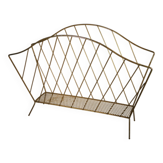 Golden metal magazine rack from the 60s