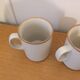 Six ceramic mugs