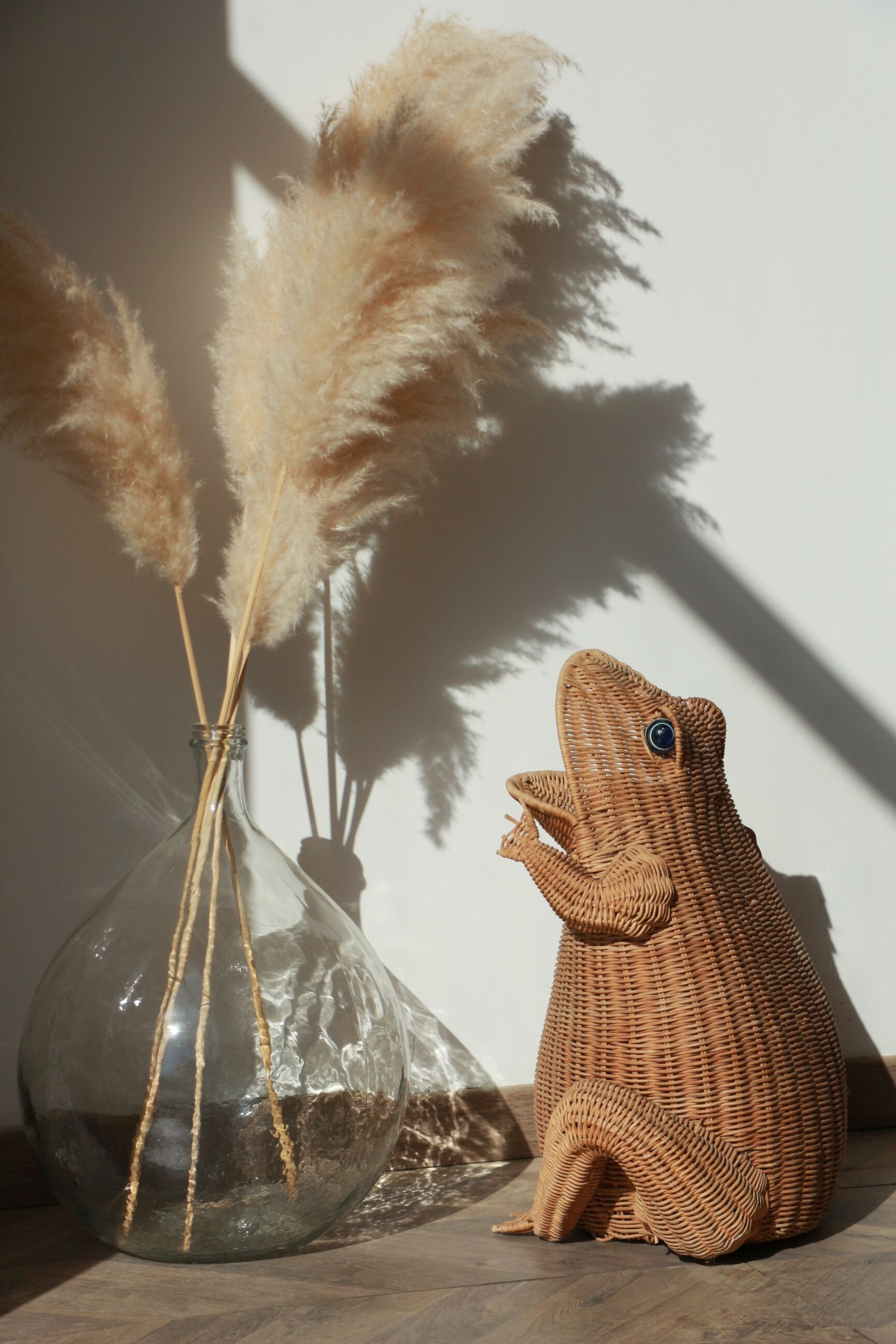 Wicker frog magazine rack by Olivier Cajan