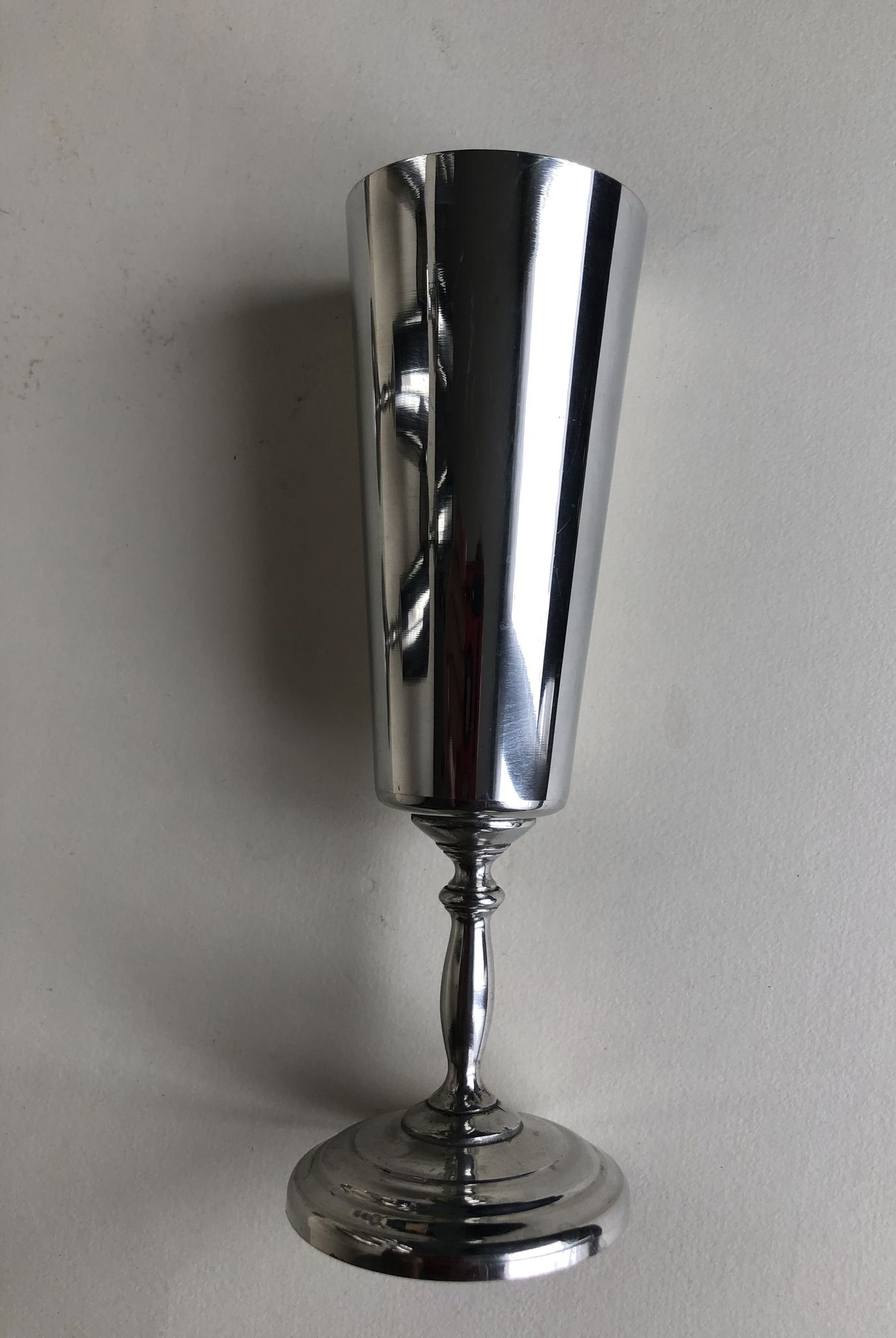 Set of eight silver metal flutes