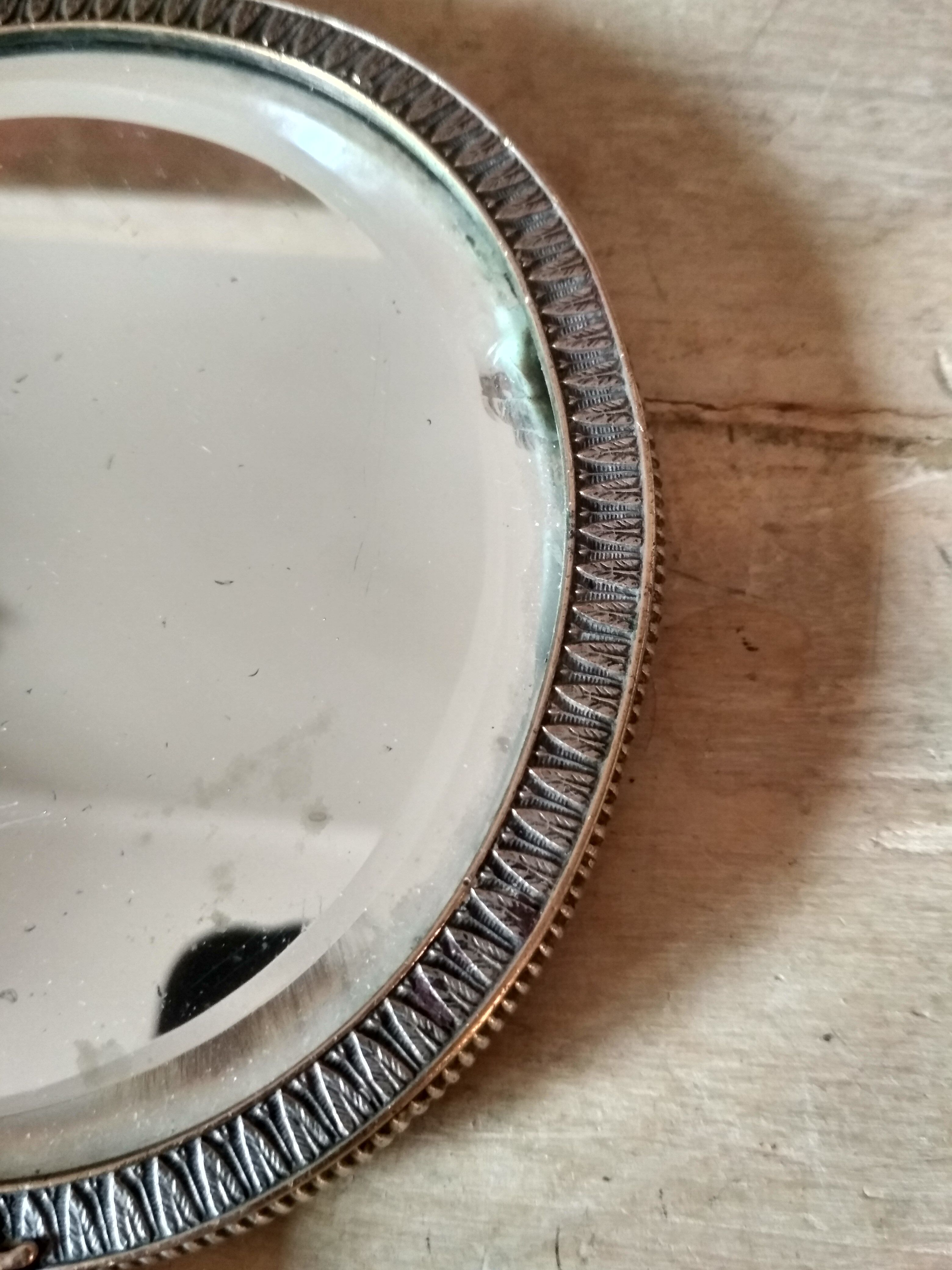 Old hand mirror beveled glass