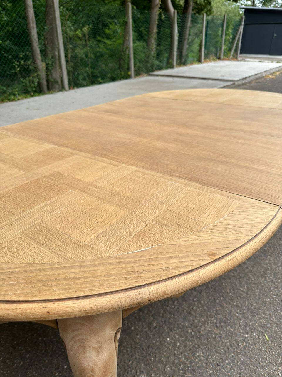 Table de repas ronde, ovale extensible en chêne poncé