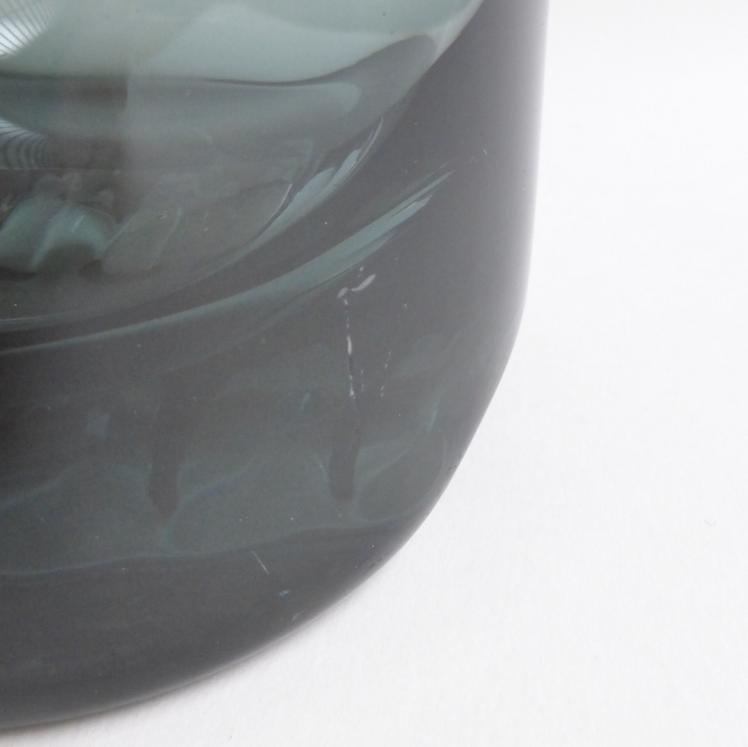 Scandinavian ashtray in 1970's moulded smoked glass
