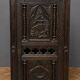 Cabinet en chêne richement sculpté, d’inspiration gothique, datant du XIXe