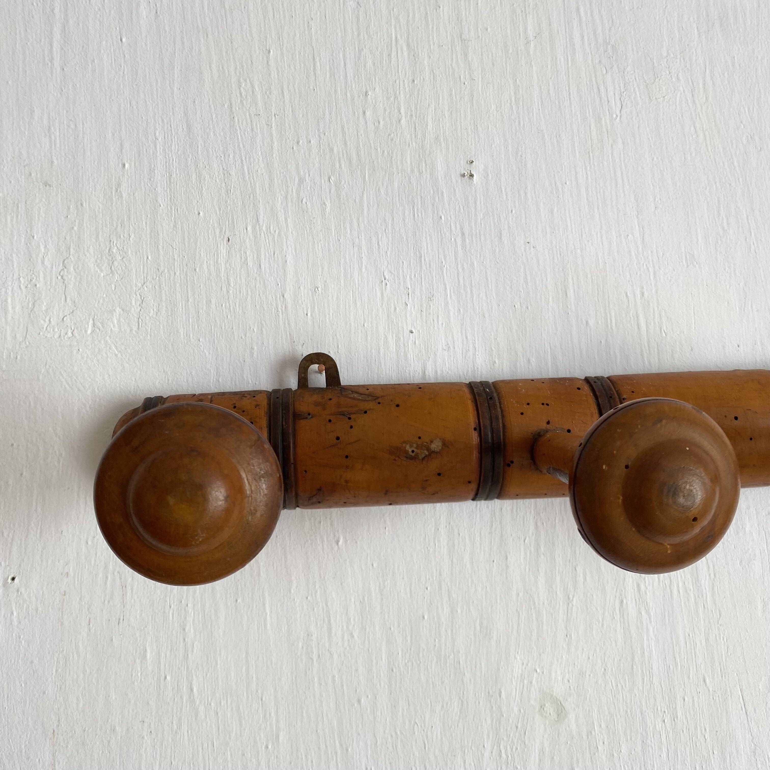 Antique turned wood wall coat rack