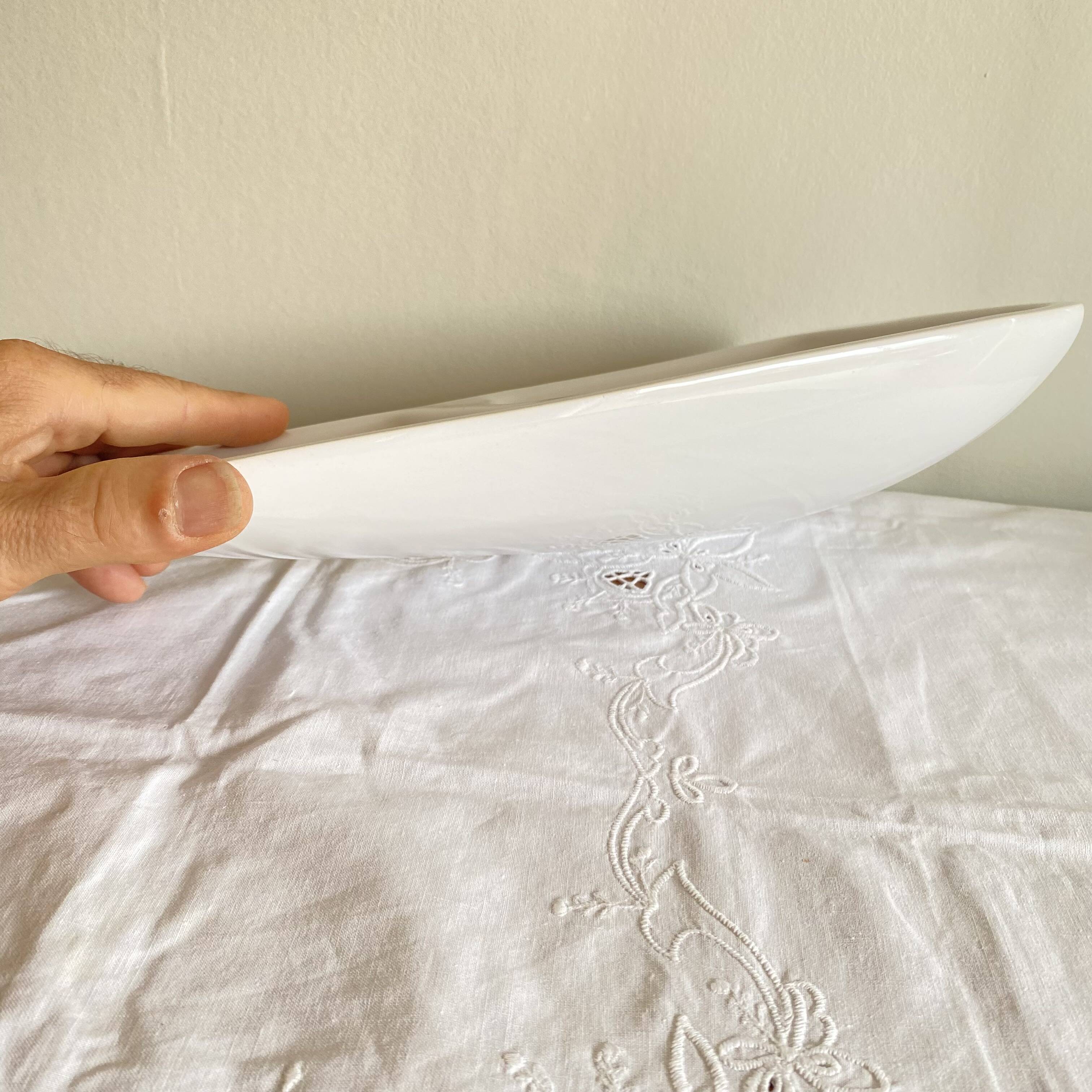 Vintage white ceramic wall-mounted soap dish