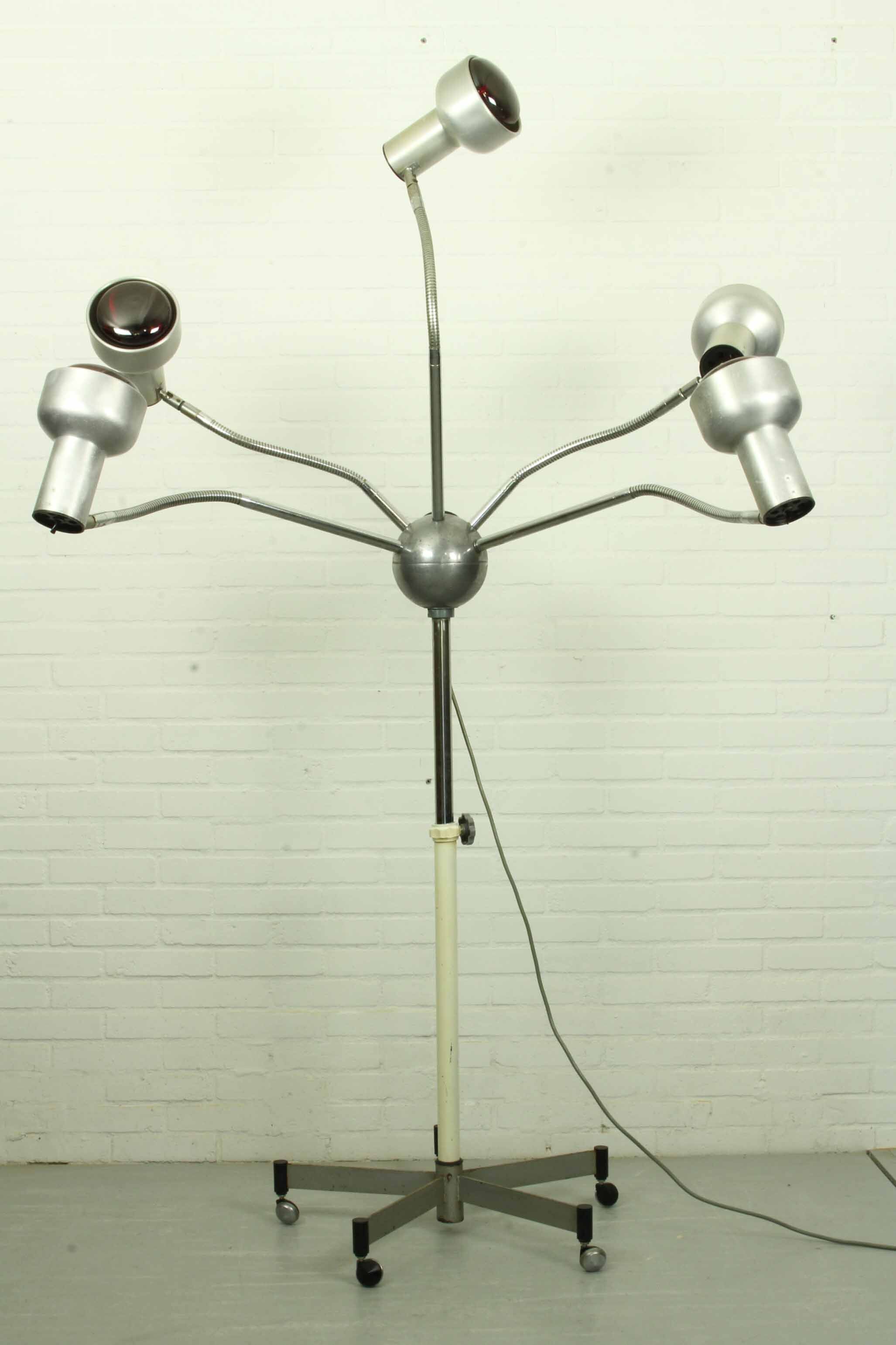 Chrome mid century modern adjustable five-arm lamp on wheel base