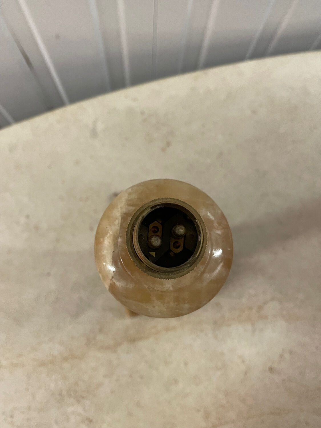 Pair of candlesticks in yellow sienna marble