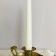 20th century chiseled brass socket candle holder representing Horsemen in armor