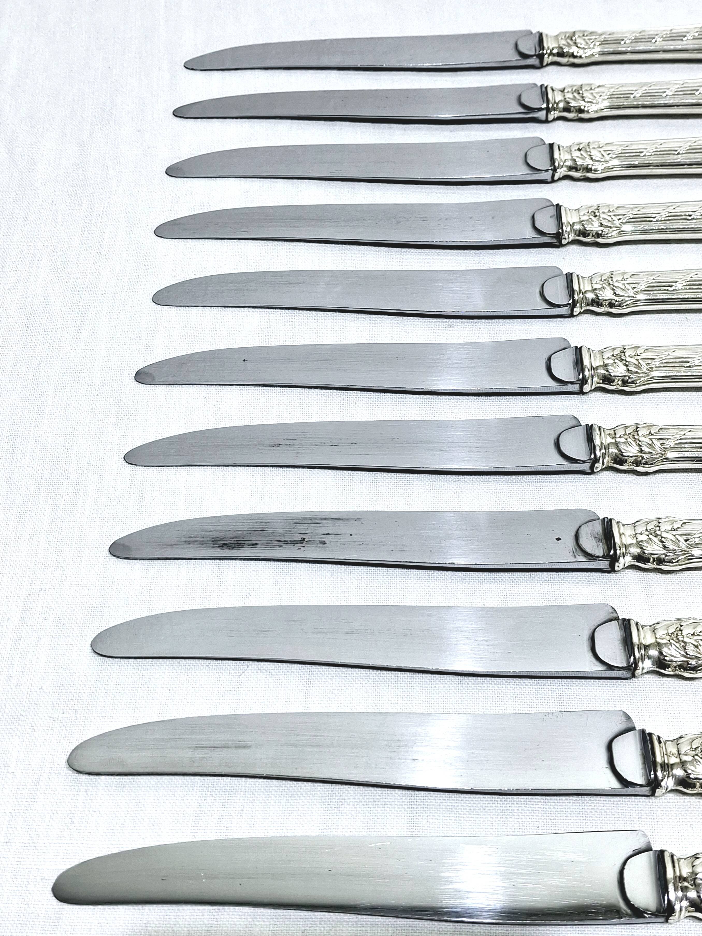 MARTIAL GAUTHIER / GEORGES FLAKENBERG - 12 KNIVES WITH SILVER HANDLES