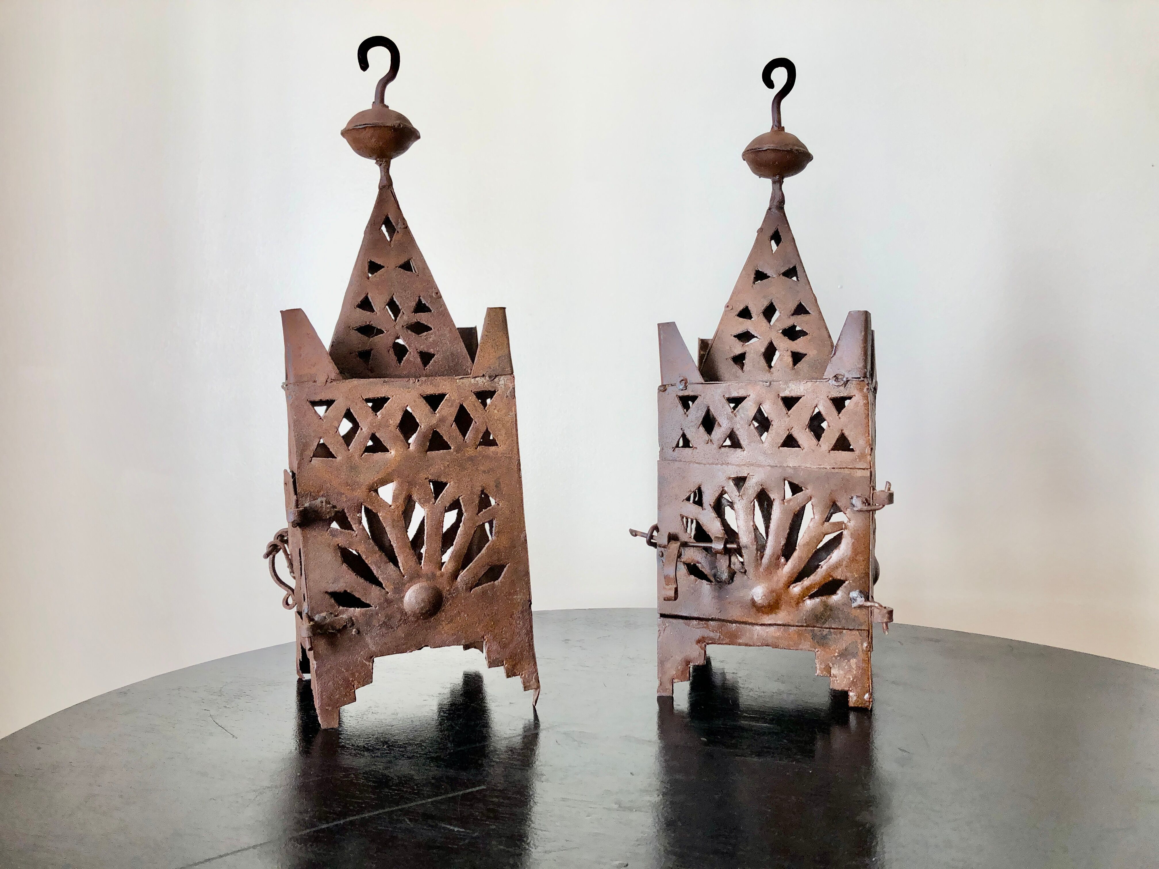 Pair of wrought iron lanterns