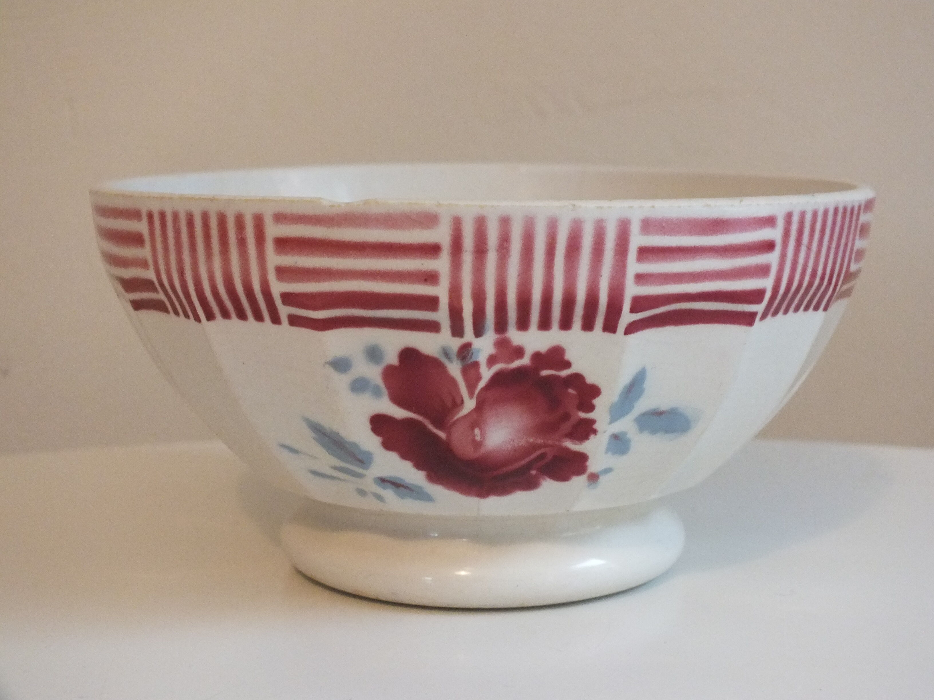 Vintage faceted bowl decorated with roses