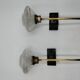 Pair of brass and glass wall lamps