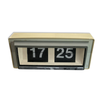 Vintage 70s flash window clock