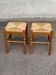 2 square stools made of carved solid wood with rush seats from the 1970s.