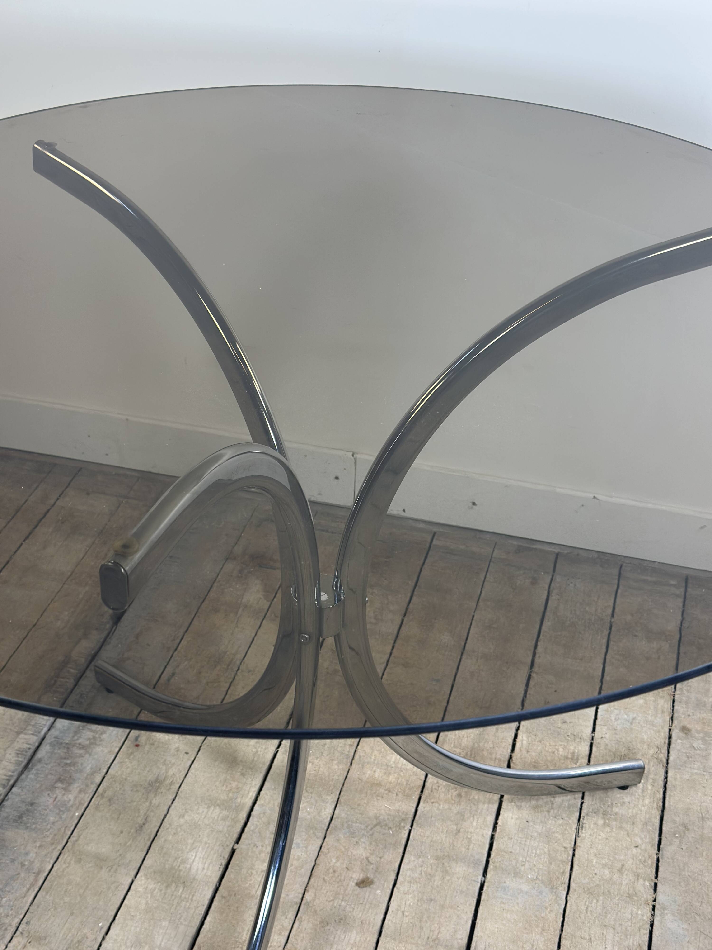 Vintage 1970s round metal and smoked glass table