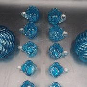 Cabaret Portieux liqueur service with 10 blue and clear glasses.