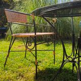 Garden table and wrought iron chair