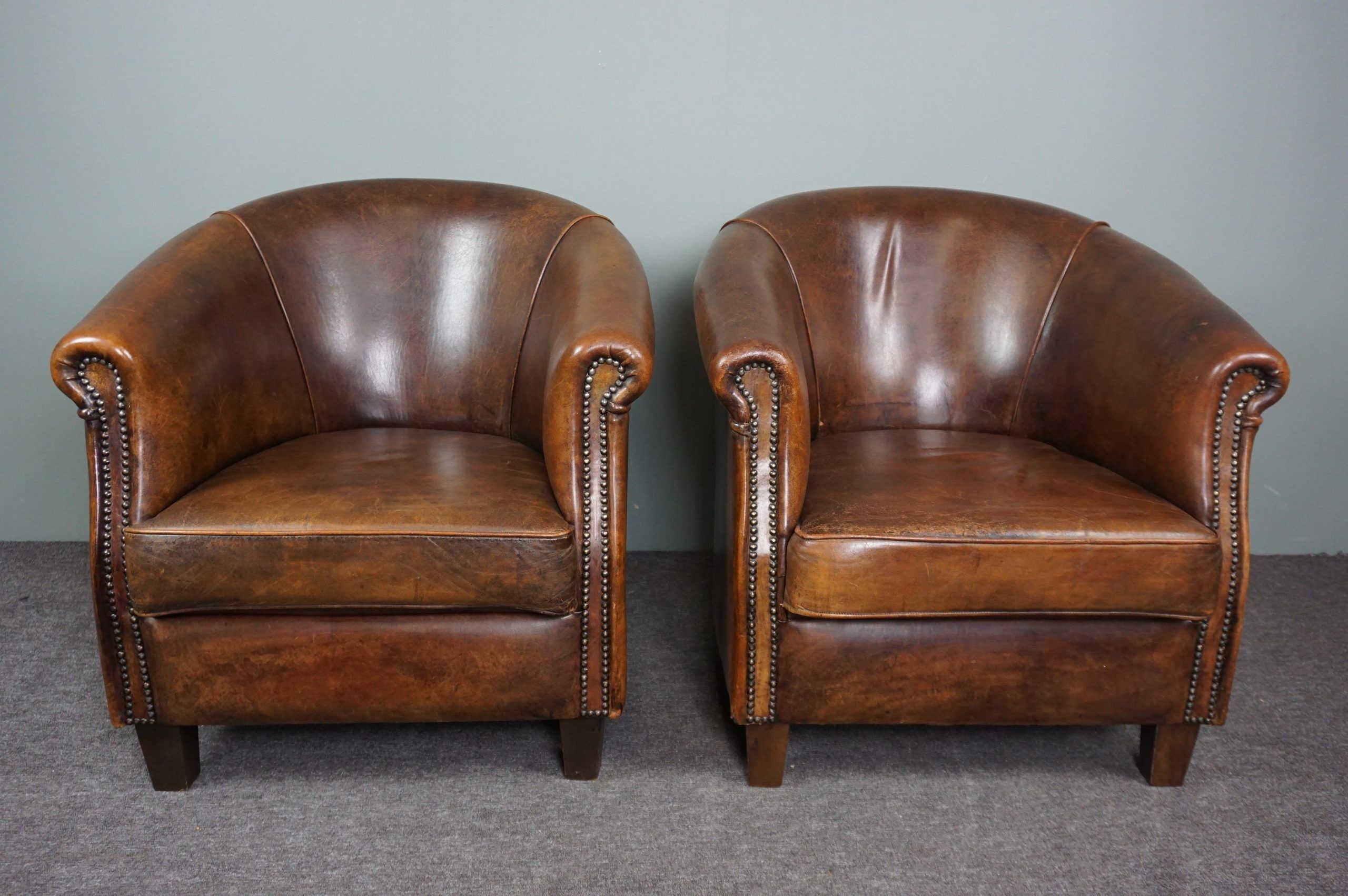 Set of 2 club armchairs in sheep leather