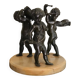 Three musician angels, bronze sculptures on a marble base.