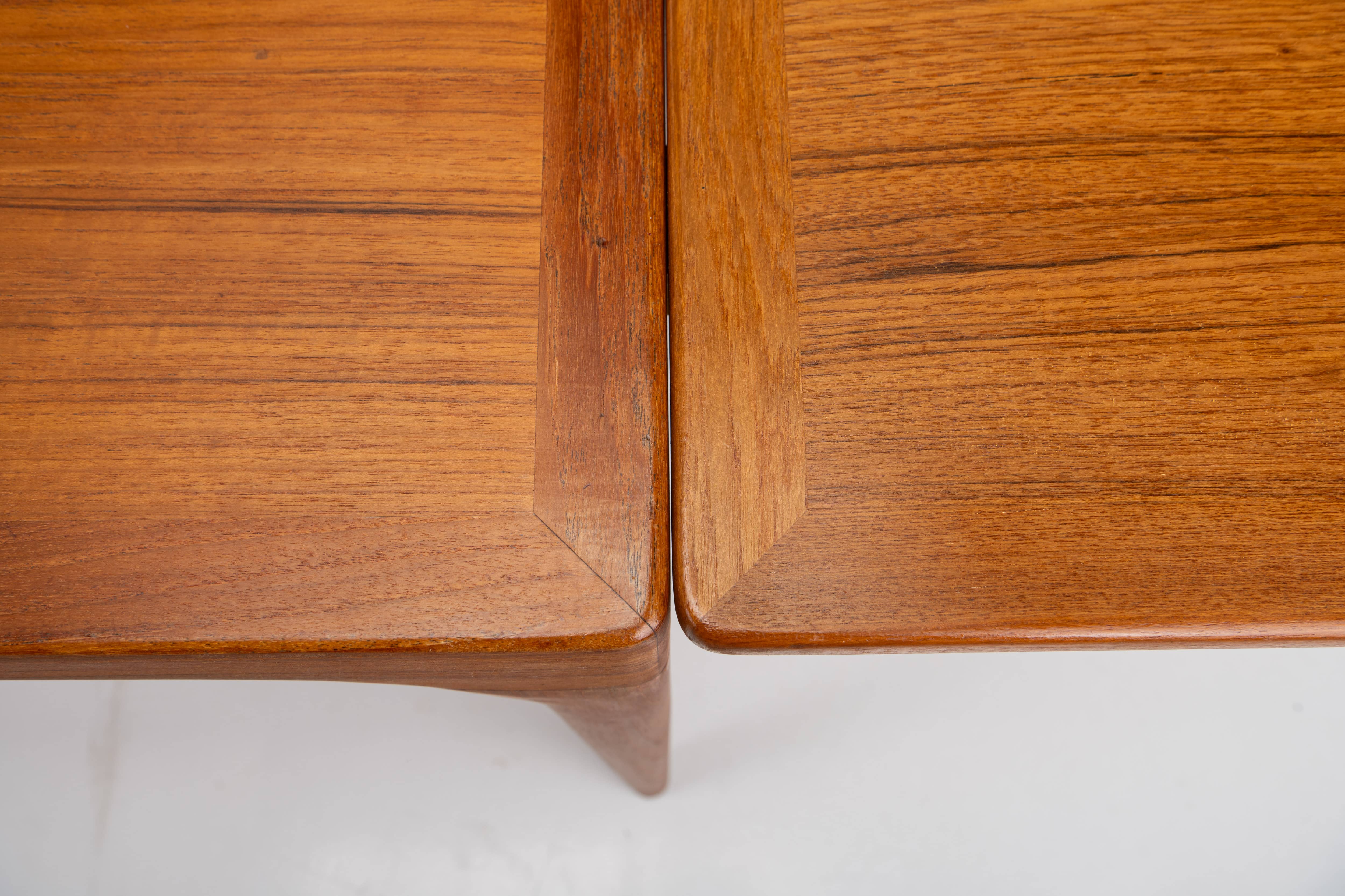 Extendable dining table in teak by Johannes Andersen for Uldum Møbelfabrik