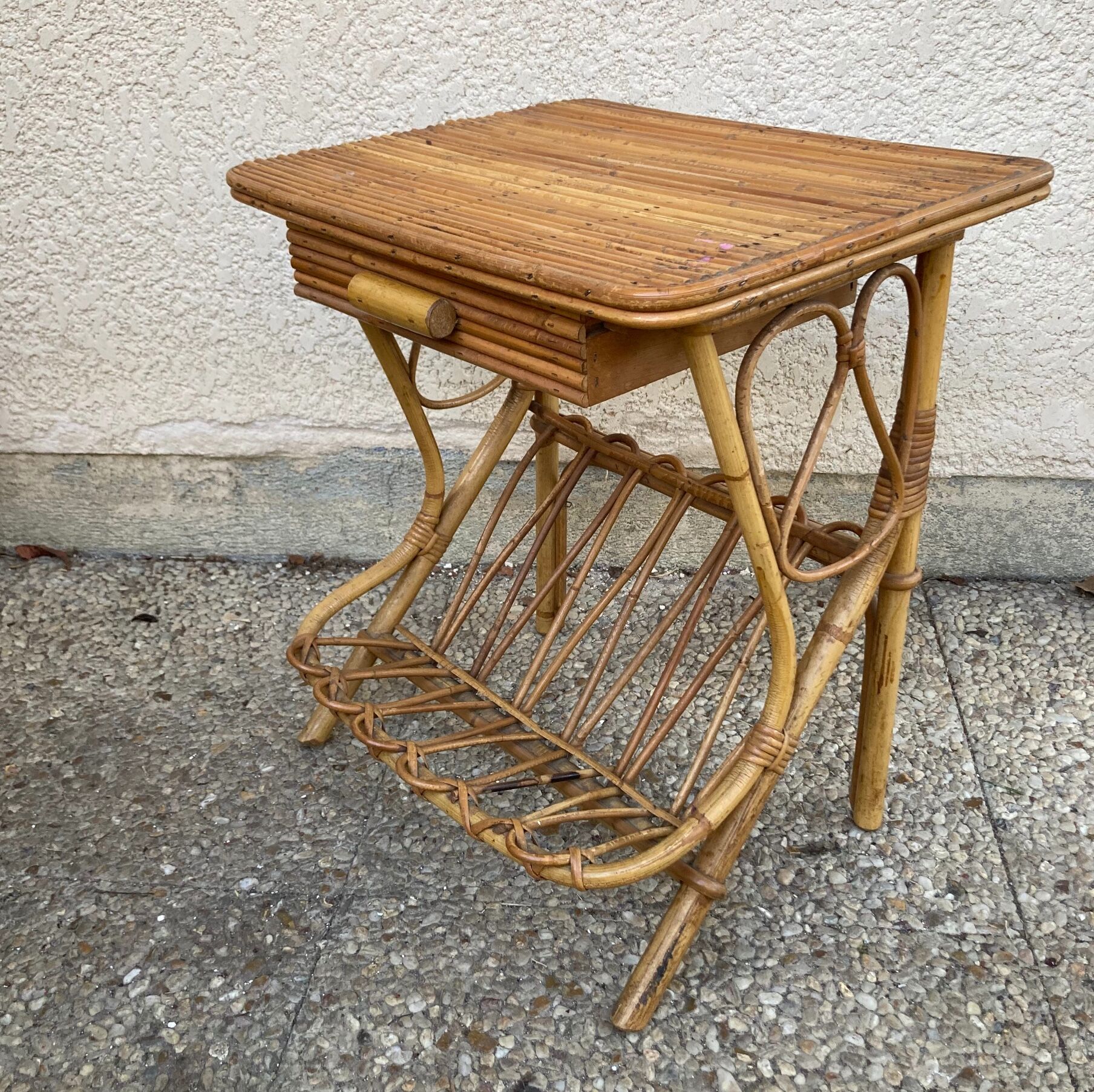 Vintage rattan magazine rack table