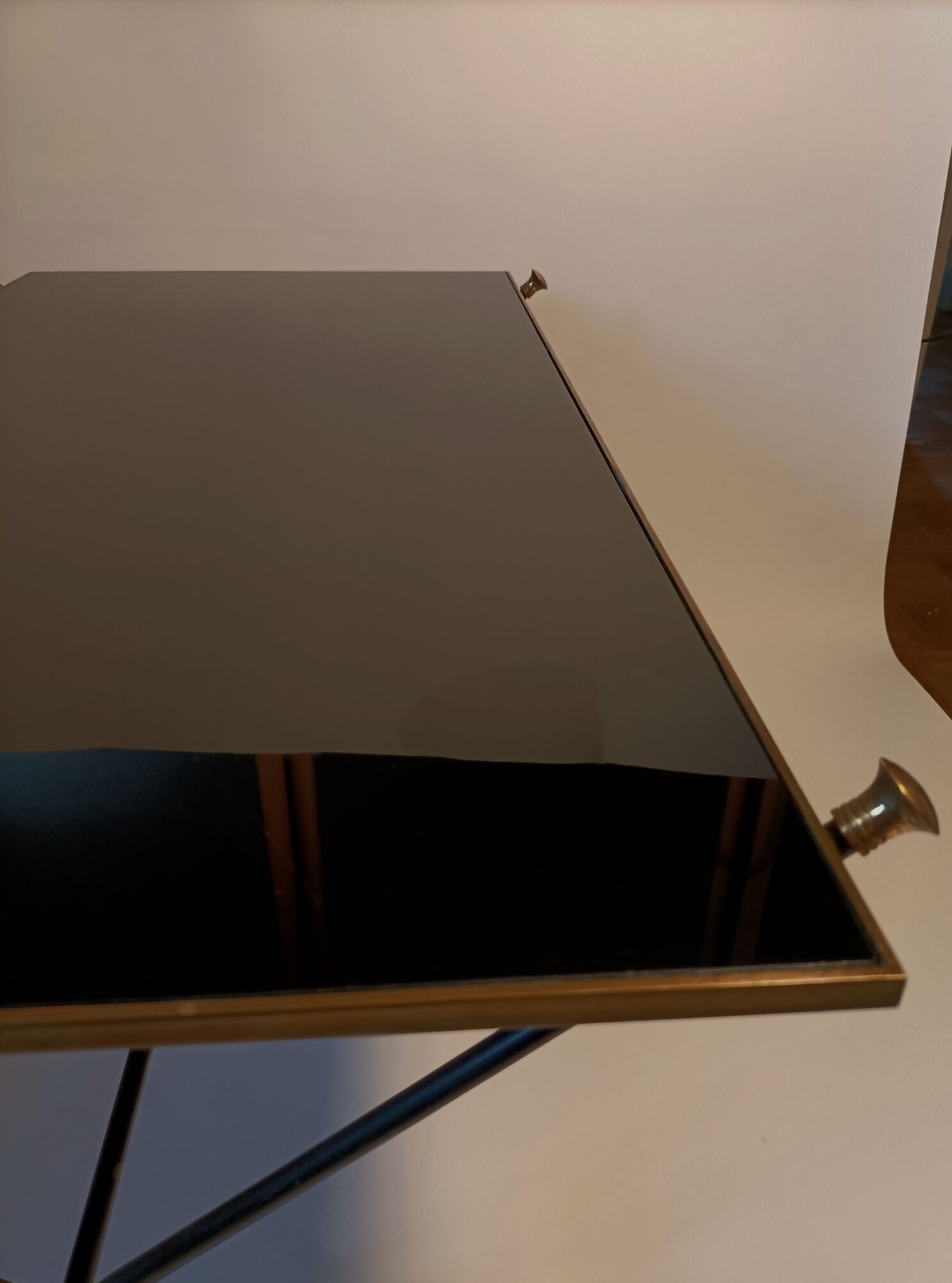 Coffee table in gilded brass, black metal and black opaline top, circa 1950