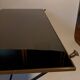 Coffee table in gilded brass, black metal and black opaline top, circa 1950