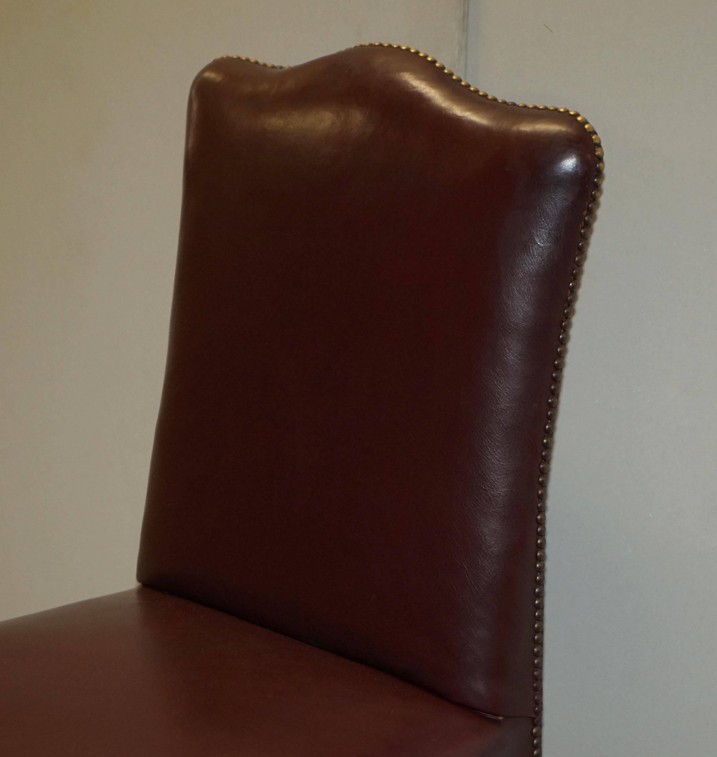 Pair of Spencer House leather office chairs