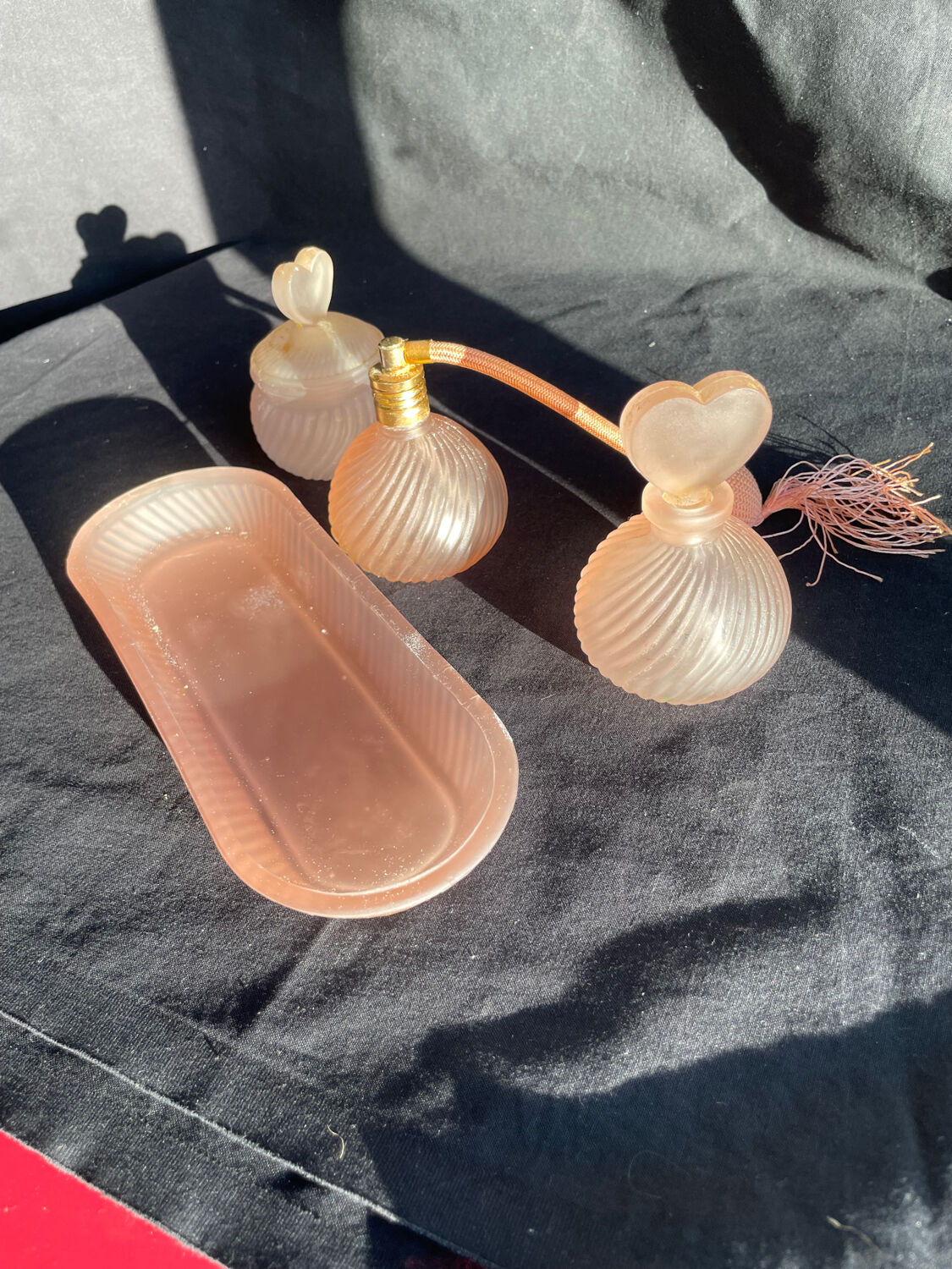Set of vintage glass pink perfume bathroom jars