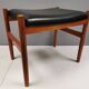 Danish designed footstool in teak wood and black skai “imitation leather”