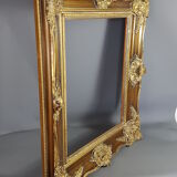 Large frame Louis XV style wood and gilded stucco patinated 78x69 cm, leaf: 55.5x46.5 cm