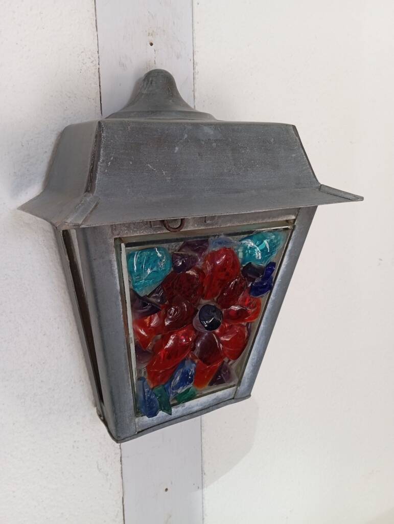 Zinc and colored glass wall light
