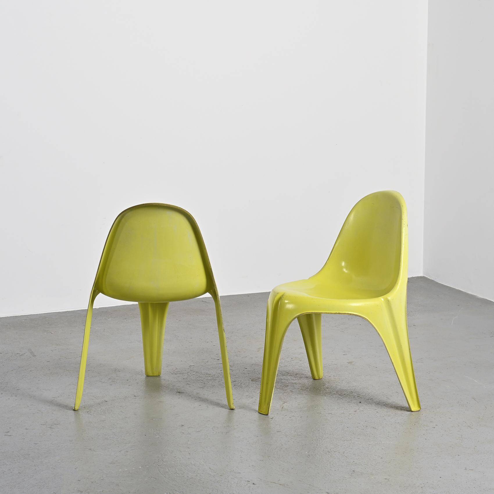 Pair of yellow fiberglass tripod chairs by Walter Frey, circa 1968