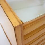1960s italian sideboard/chest of drawers in high gloss finish with glass top and shelf
