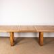 Large extendable dining table in solid oak by Guillerme and Chambron.